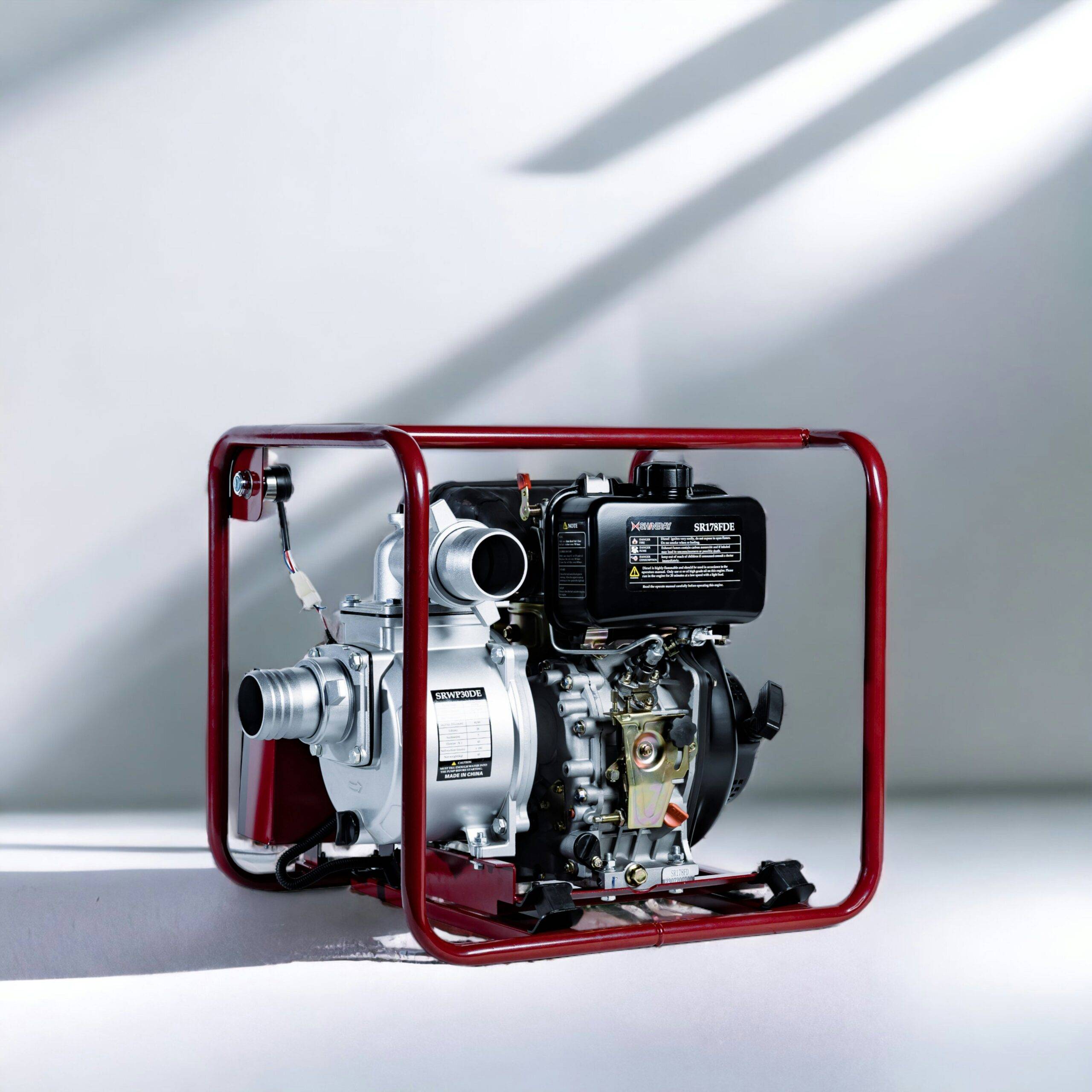 Generator with a silver engine and black control panel, framed in a red protective casing, set against a neutral background, relevant to generator maintenance and readiness in emergency situations.